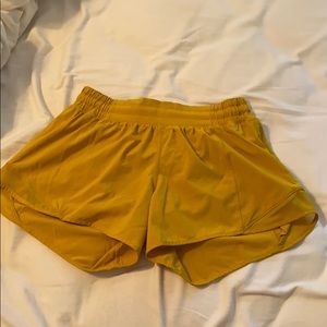 mustard yellow lululemon hotty hot shorts